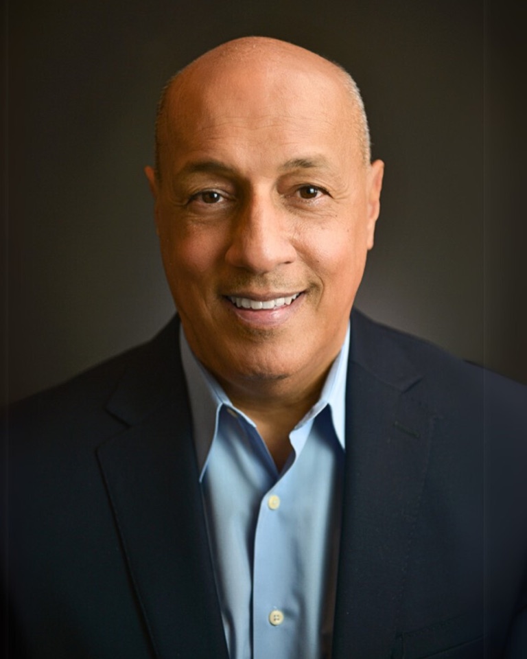 Natural studio actor headshot with relaxed confidence