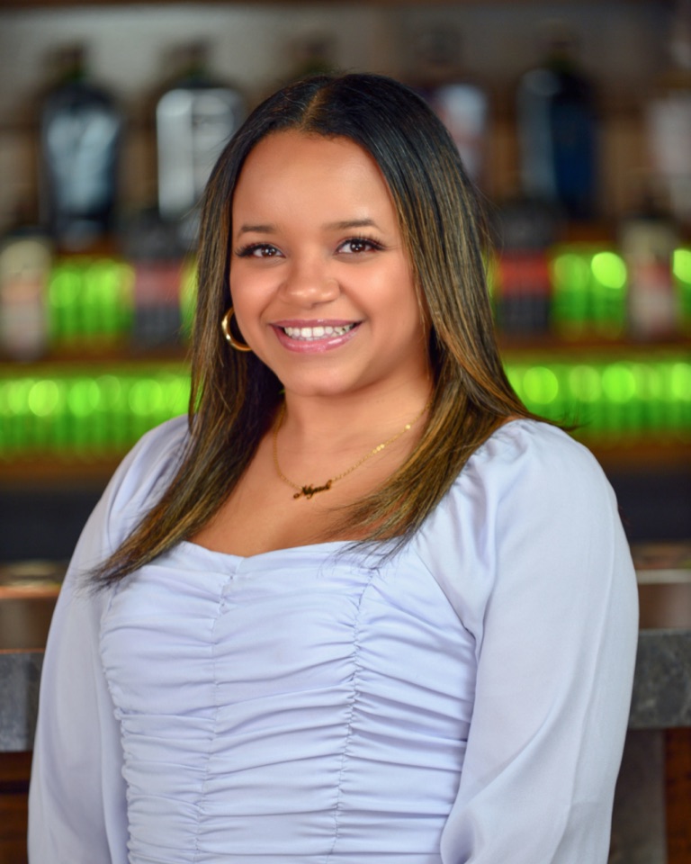 Business professional headshot photographed in an NYC office