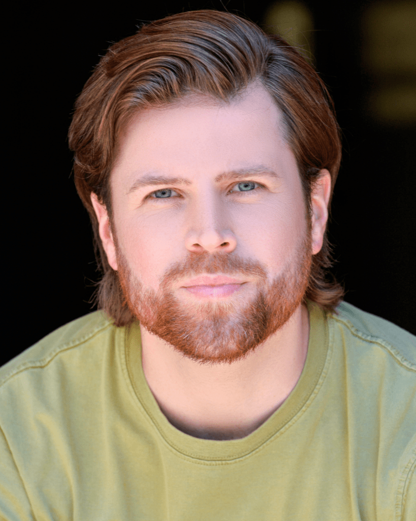 Professional headshot of a college professor in New York City